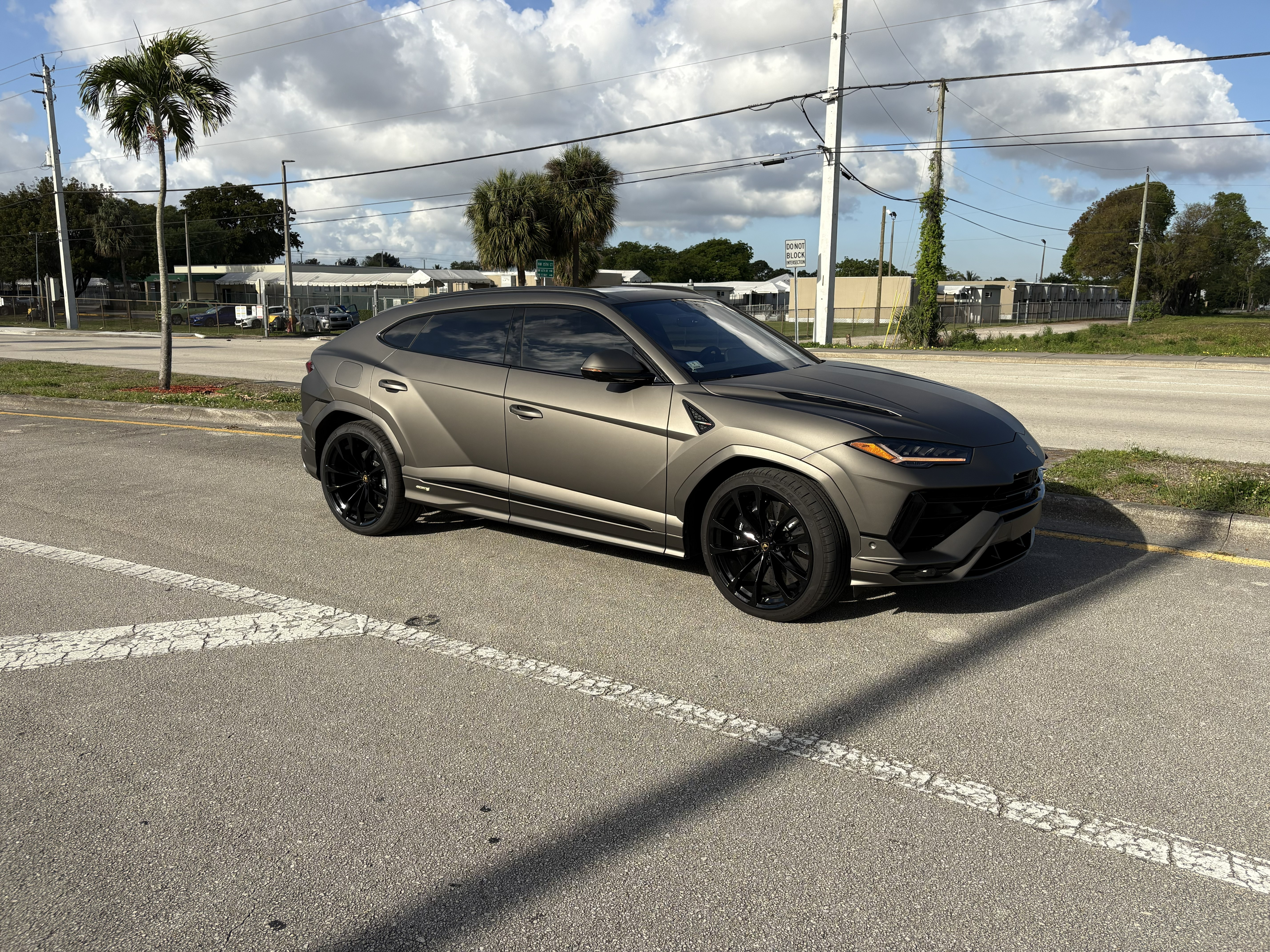 Lamborghini Urus full matte bronze vehicle wrap by ER Window Tinting South Florida